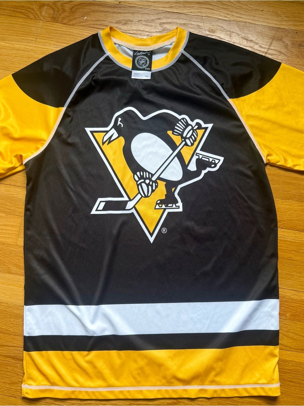 NHL Black and Gold Collar Hockey Jersey Tag Detail